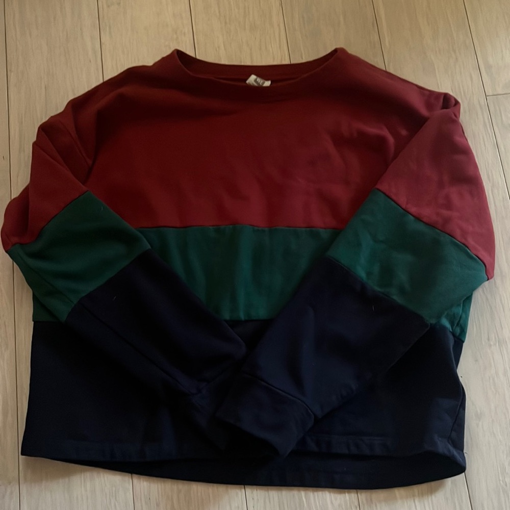 Me To We medium size red green and blue pullover